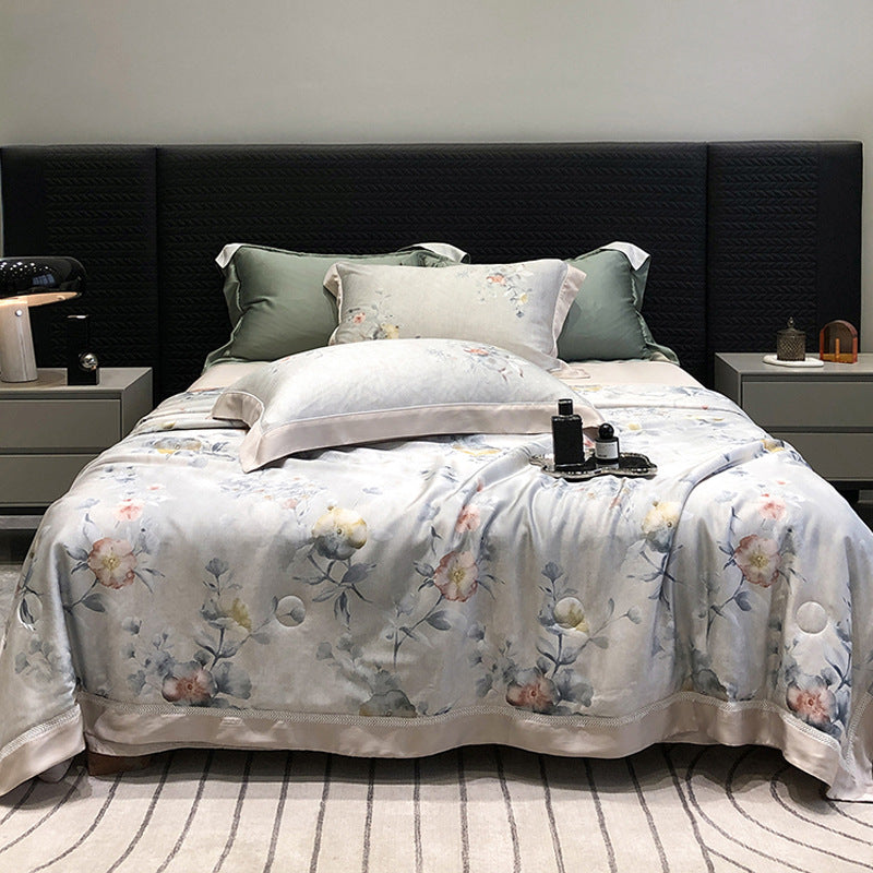 Luxurious cotton satin bedding set with floral watercolor print and fine satin trim