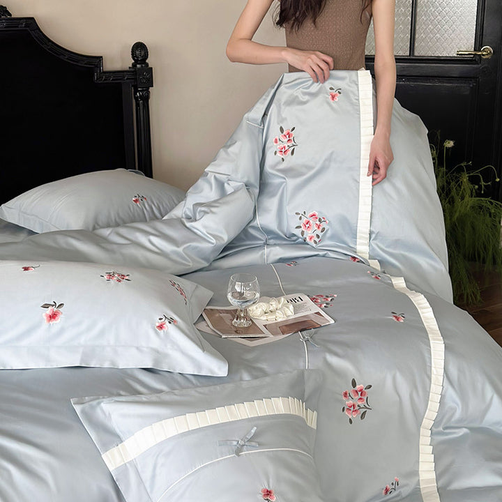 Elegant cotton satin bedding set with fine rose embroidery and pleated ruffle