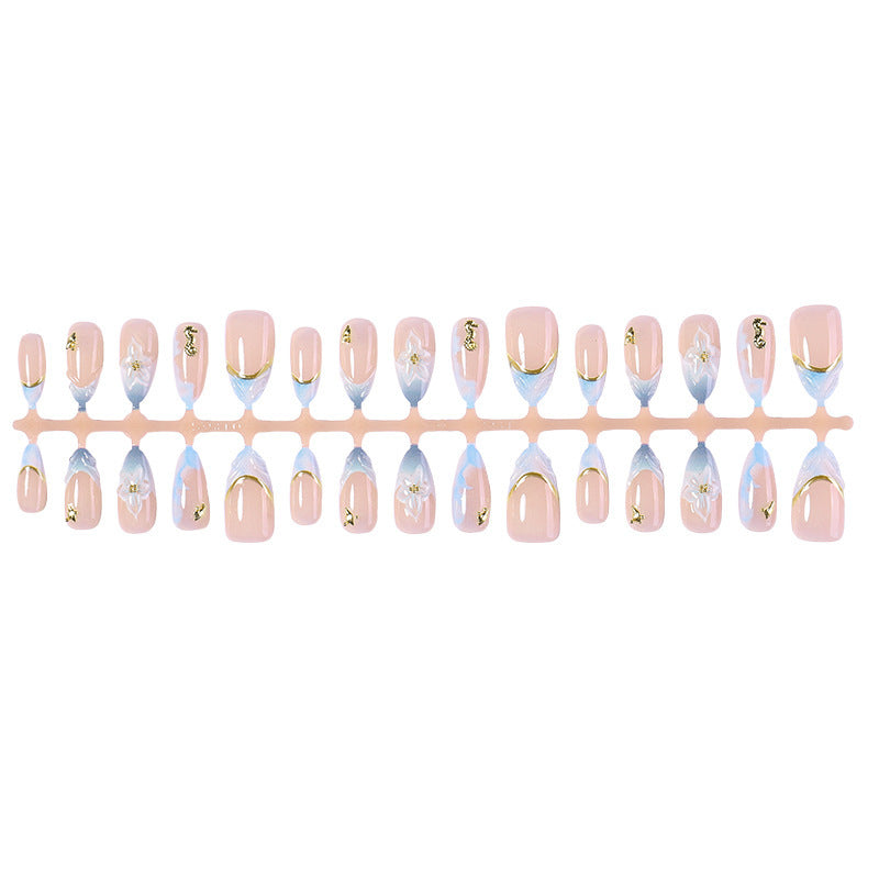 Creative nail set with elegant gold embellishments Kalsten