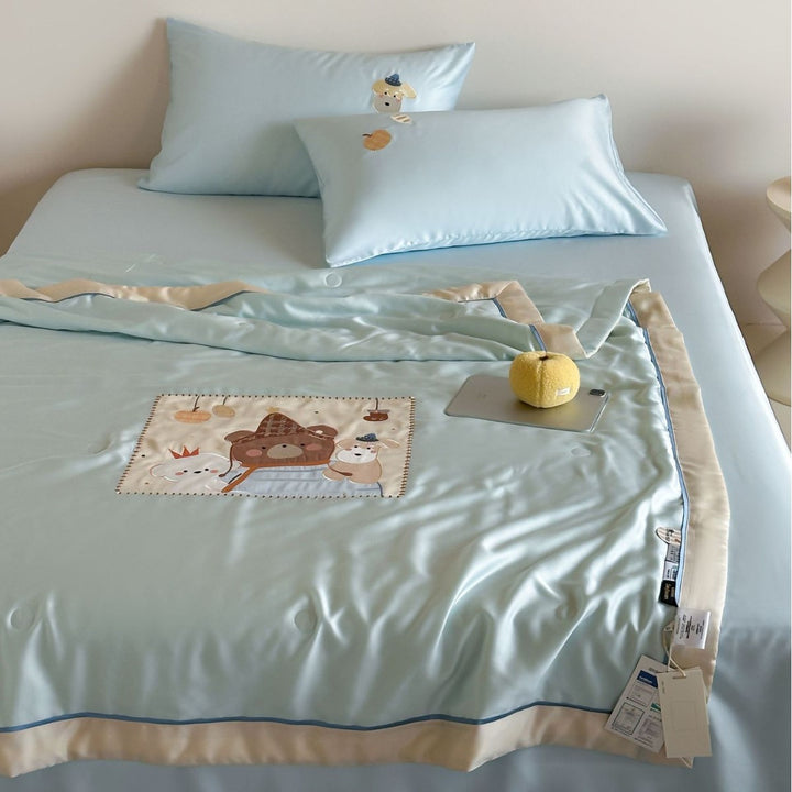 Satin bedding set with embroidered cat appliqués and silky soft finish