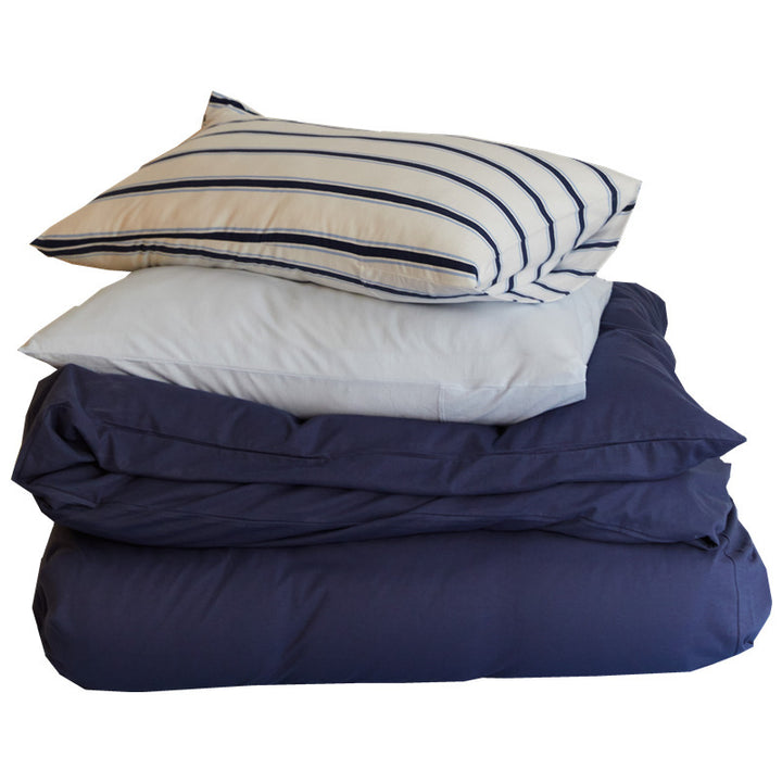 Bedding set made of cotton percale with striped pillowcase and smooth duvet cover