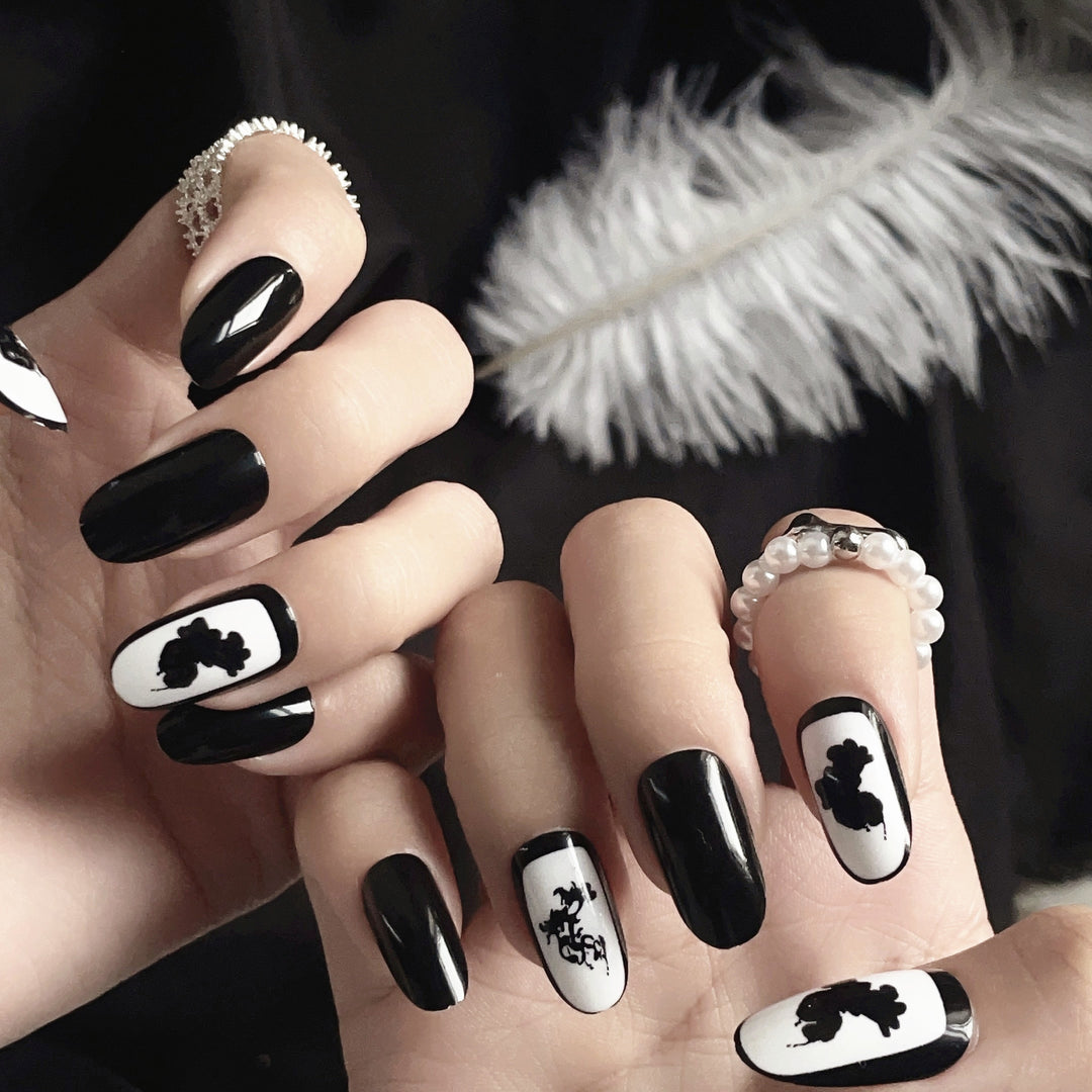Artistic Press-On Nail Set with Floral and Abstract Designs