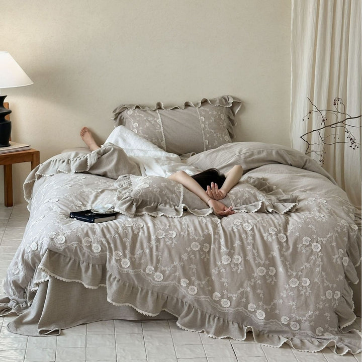 Linen bedding set with floral embroidery, ruffle and bed skirt