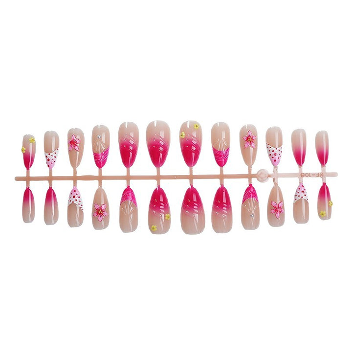 Artful nail tips with delicate floral embellishments Kalsten