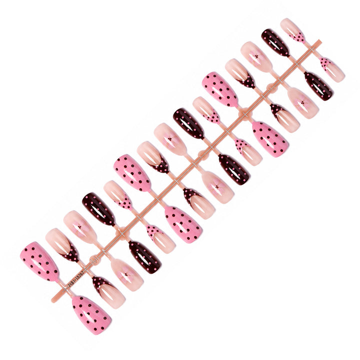 Artificial nail set with playful dots and floral accents Kalsten