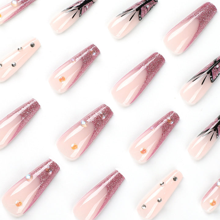 Artful stiletto nails with floral and glittering accents Kalsten
