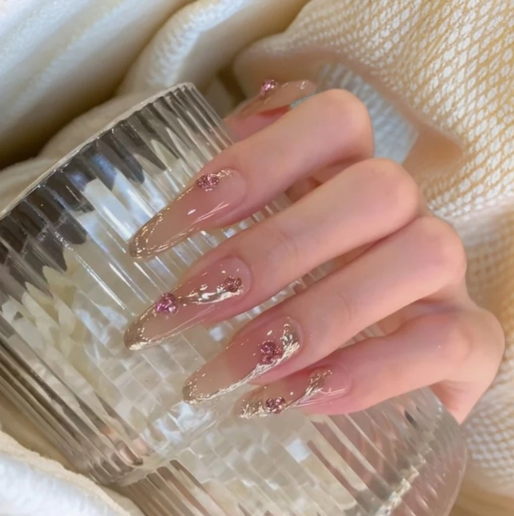 Decorative Acrylic Nail Extensions with Floral Accents