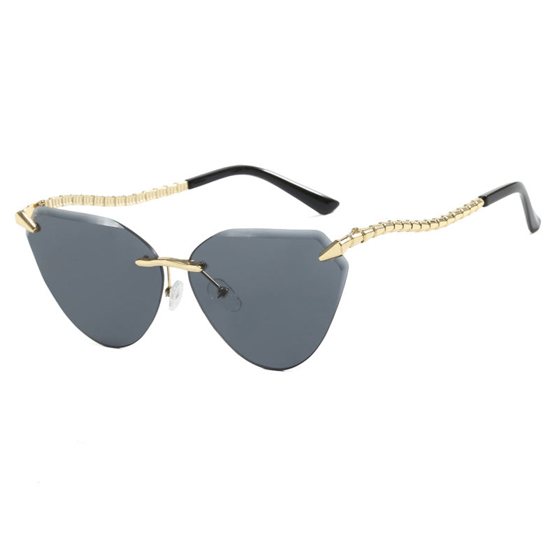 Women's Cat-Eye Sunglasses with unique gold frame design and protective lenses Kalsten