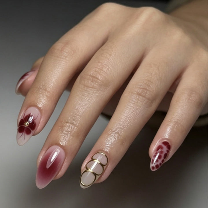 Artificial nails with elaborate flower designs and elegant accents Kalsten