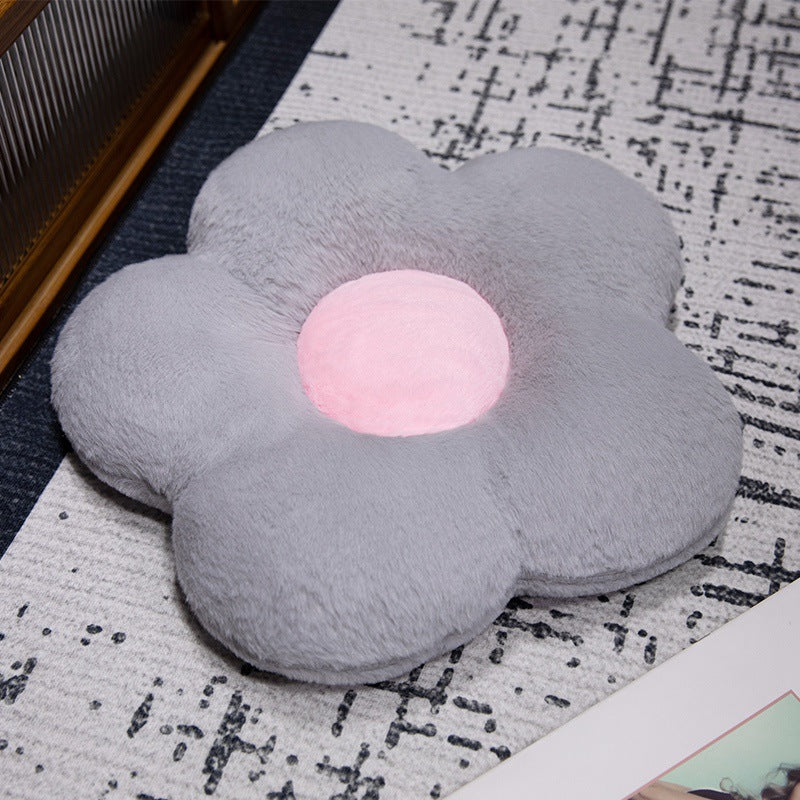 Padded seat cushion in flower shape with faux leather center piece and fluffy edge padding