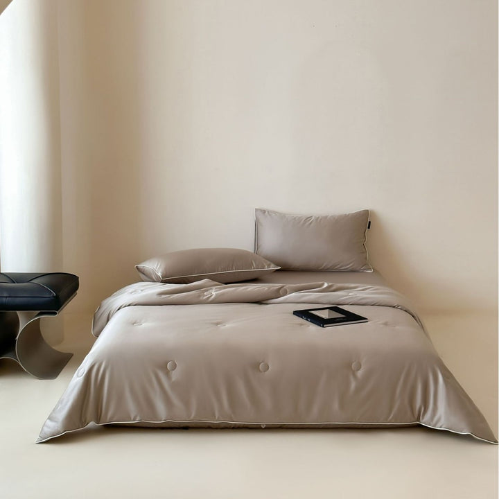 Elegant quilted satin bedspread set with piping and decorative buttons Kalsten