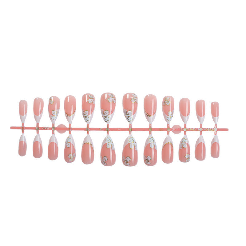Artificial nail set with elegant flower and French tip design Kalsten