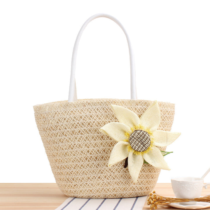 Handbag with floral appliqué Made of natural material Kalsten