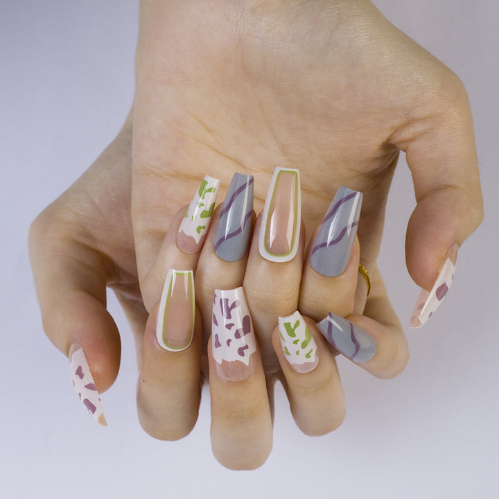 Artificial nails in modern design with geometric patterns Kalsten