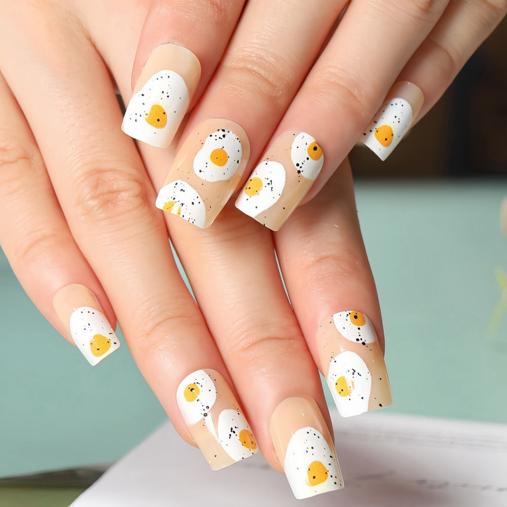Artificial nails in creative fried egg design Kalsten