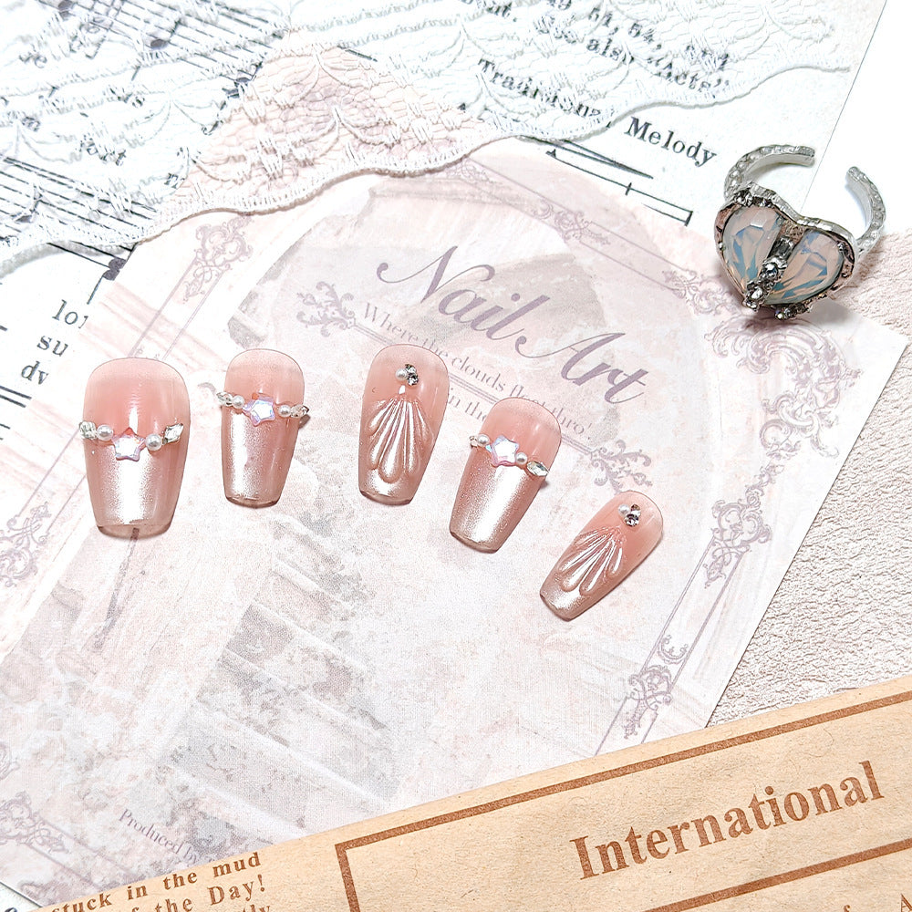 Elegant artificial nails with pearl and rhinestone embellishments Kalsten