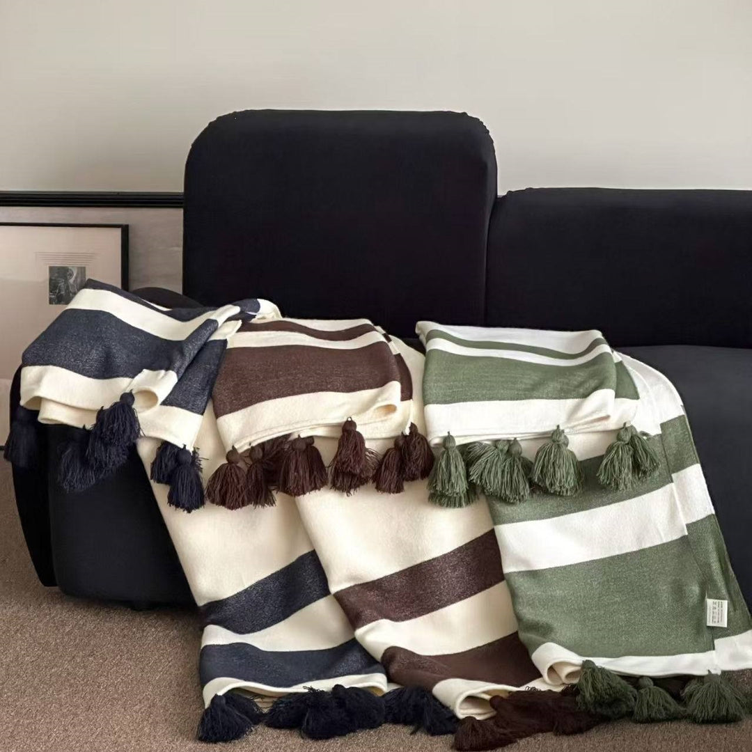 Soft woven blanket with tassels and diagonal stripes