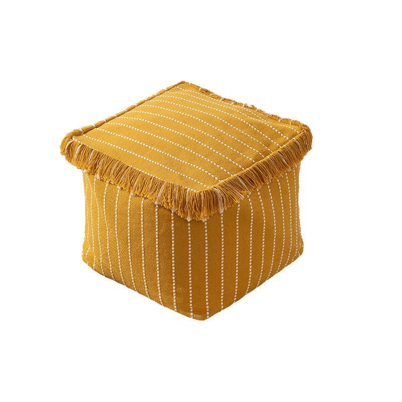 Woven decorative pouf with fringes and structured striped look