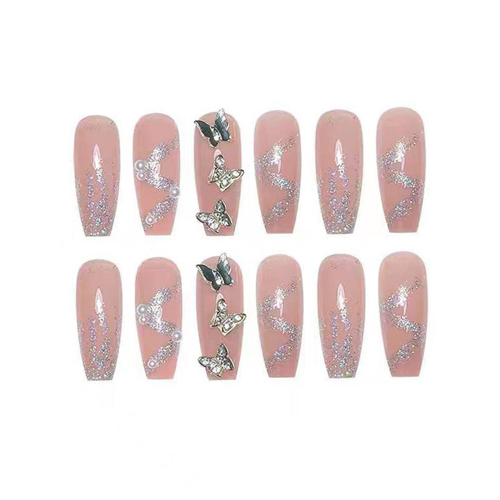 Artificial nails with sparkling rhinestone and bow accents Kalsten