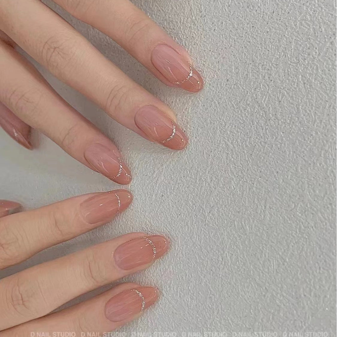 Elegant Press-On Nail Art with Subtle Glitter Accents