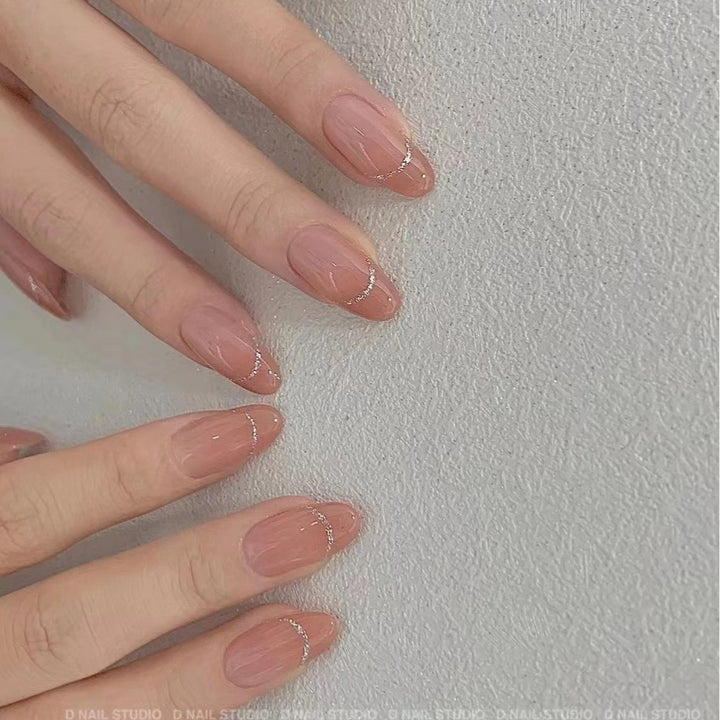 Elegant Press-On Nail Art with Subtle Glitter Accents