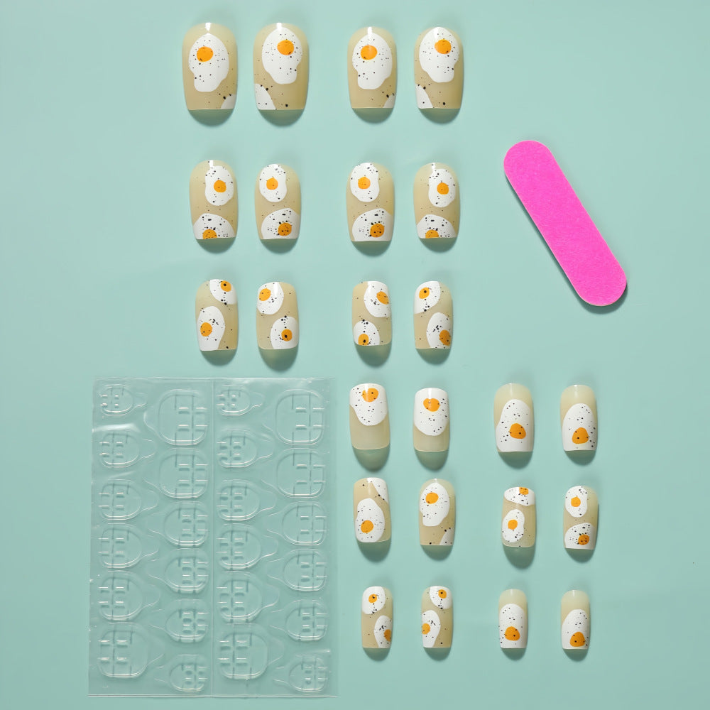 Artificial nails in creative fried egg design Kalsten