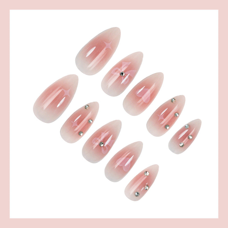 Artificial nail set with romantic heart and bow motifs Kalsten
