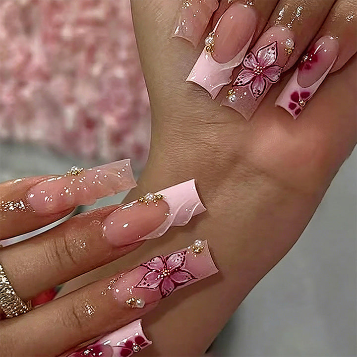 Elegant artificial nails with hand-painted floral accents Kalsten