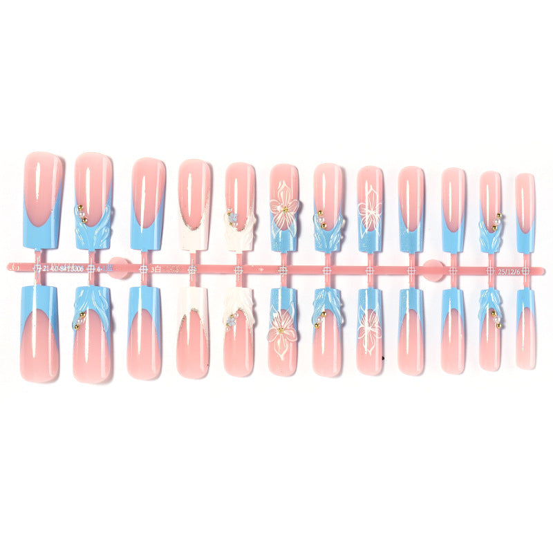 Artistic Nail Art Set with Floral and Glossy Accents kalsten