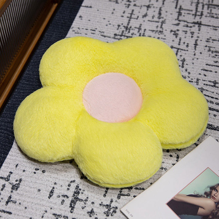 Padded seat cushion in flower shape with faux leather center piece and fluffy edge padding