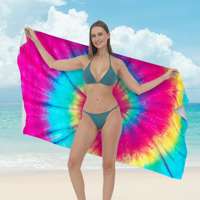 Beach towel with vibrant tropical plant motif Kalsten