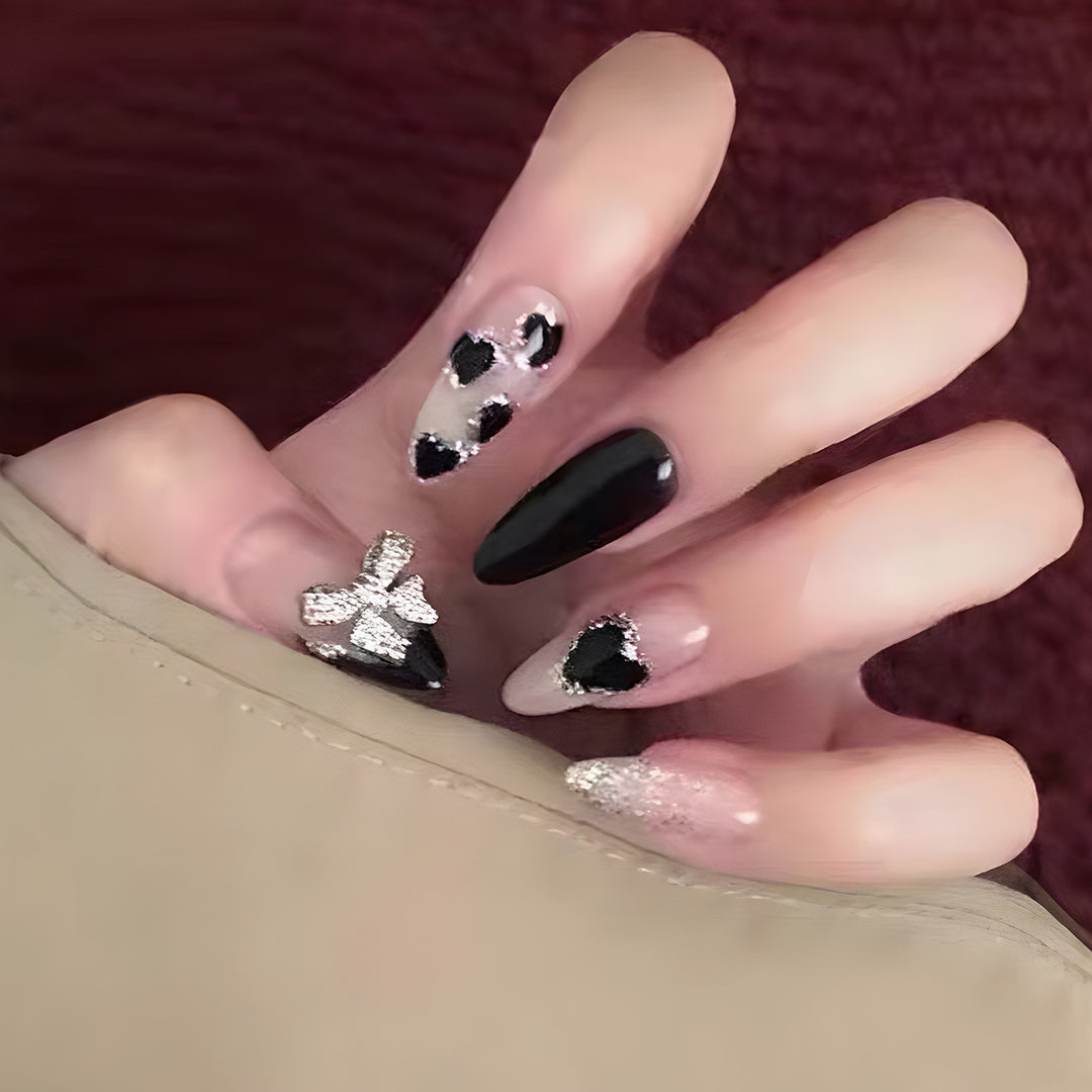 Artistic Stiletto Press-On Nails with Heart and Bow Accents Kalsten