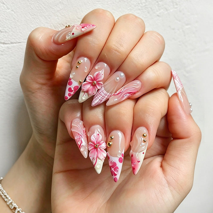 Creative art nail set with floral and glittering accents Kalsten