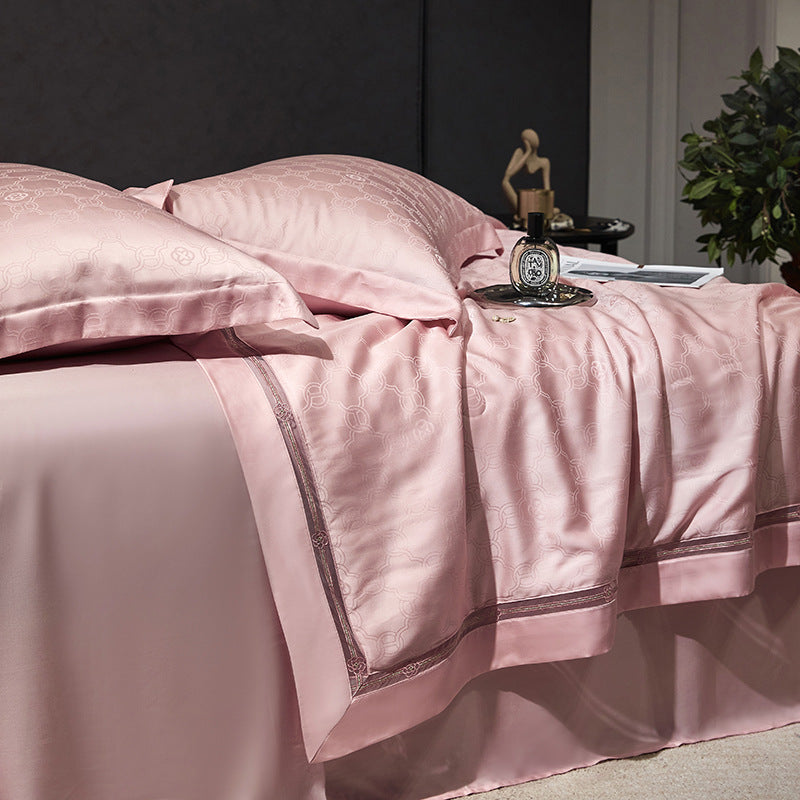 Luxurious quilted bedspread with satin jacquard and decorative border
