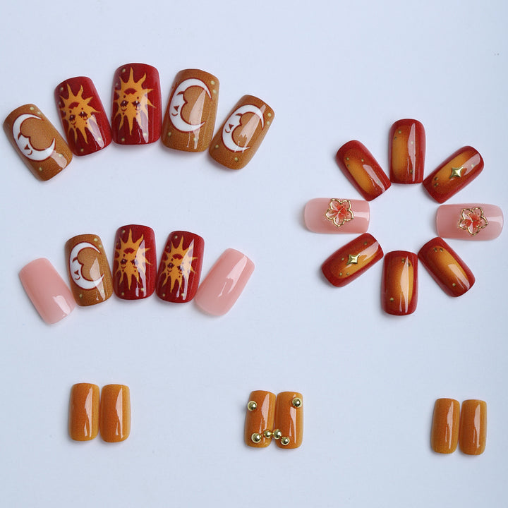 Artificial nails with floral motifs and glitter accents Kalsten