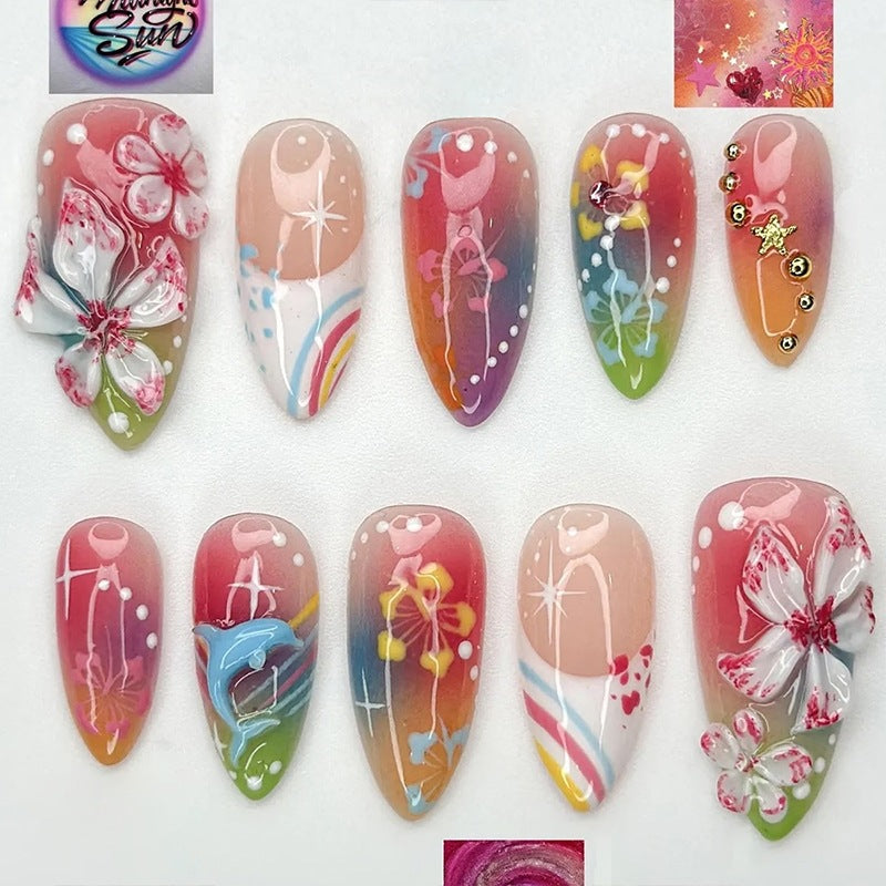 Artificial nail set with various designs and shiny embellishments Kalsten