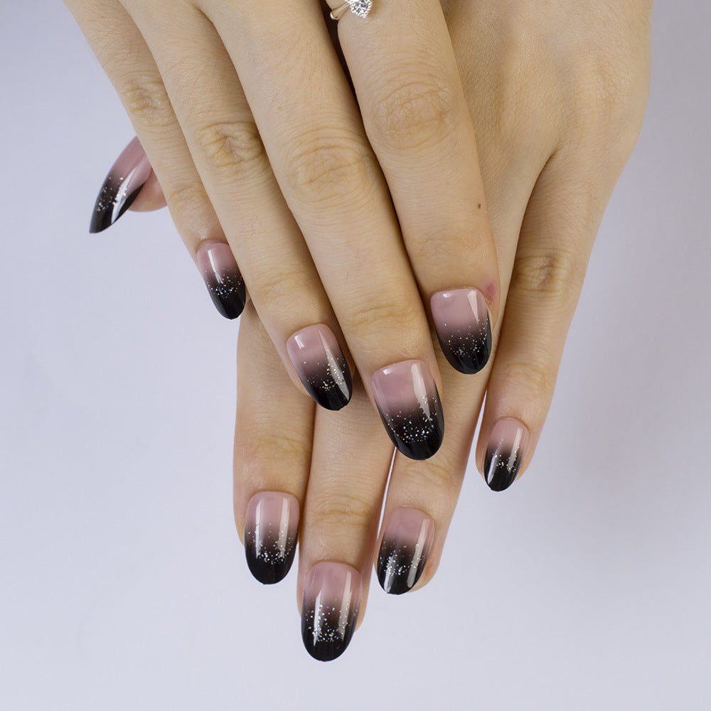 Elegant artificial nails in modern ombre style with glitter accents Kalsten