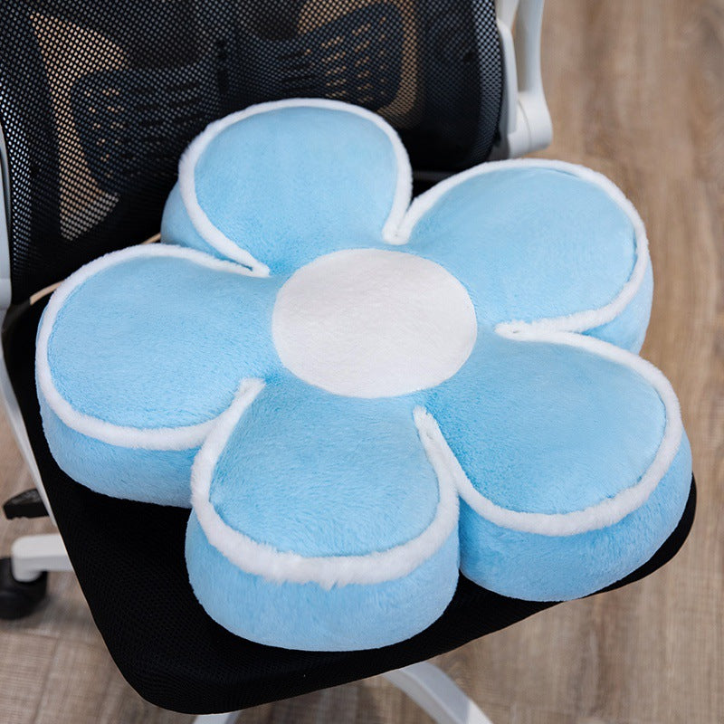 Padded seat cushion in flower shape with faux leather center piece and fluffy edge padding