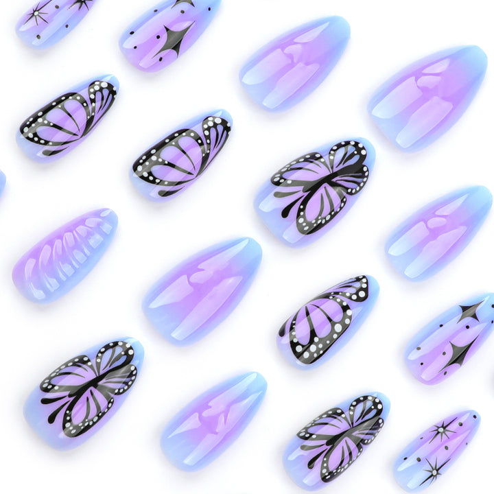 Artful stiletto nails with elegant butterfly design Kalsten