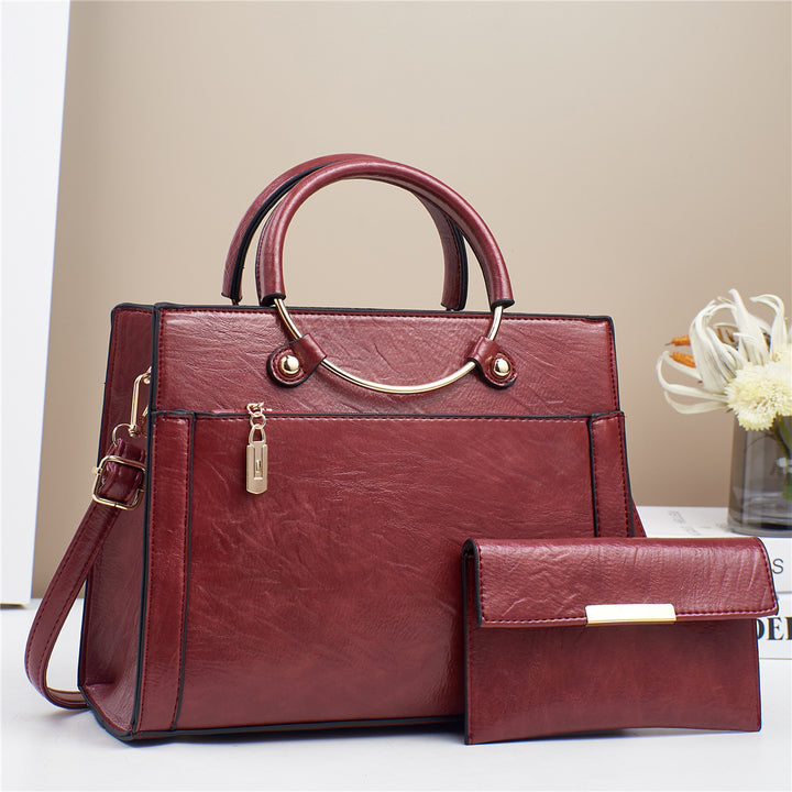 Elegant handbag with detachable shoulder strap and matching wallet Kalsten