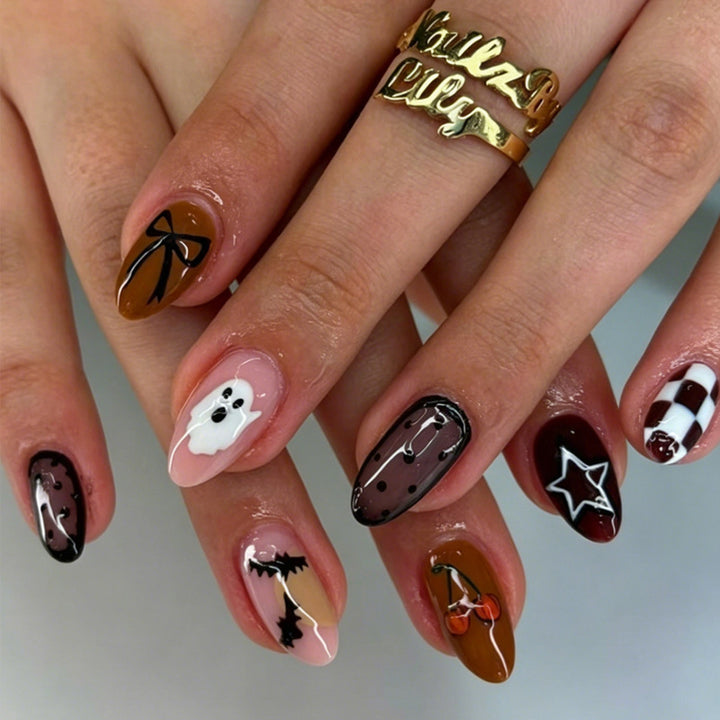 Artificial nail set with creative Halloween designs and glittering accents Kalsten