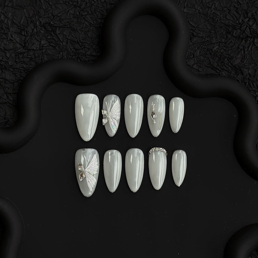 Artistic Press-On Nail Set with Elegant Butterfly and Gem Accents