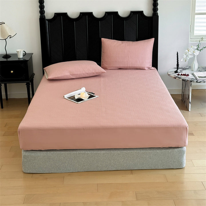 Comfort mattress topper with textured waffle surface and deep edge