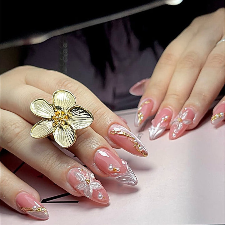 Artificial nail set with elegant silver tip design and floral accents Kalsten