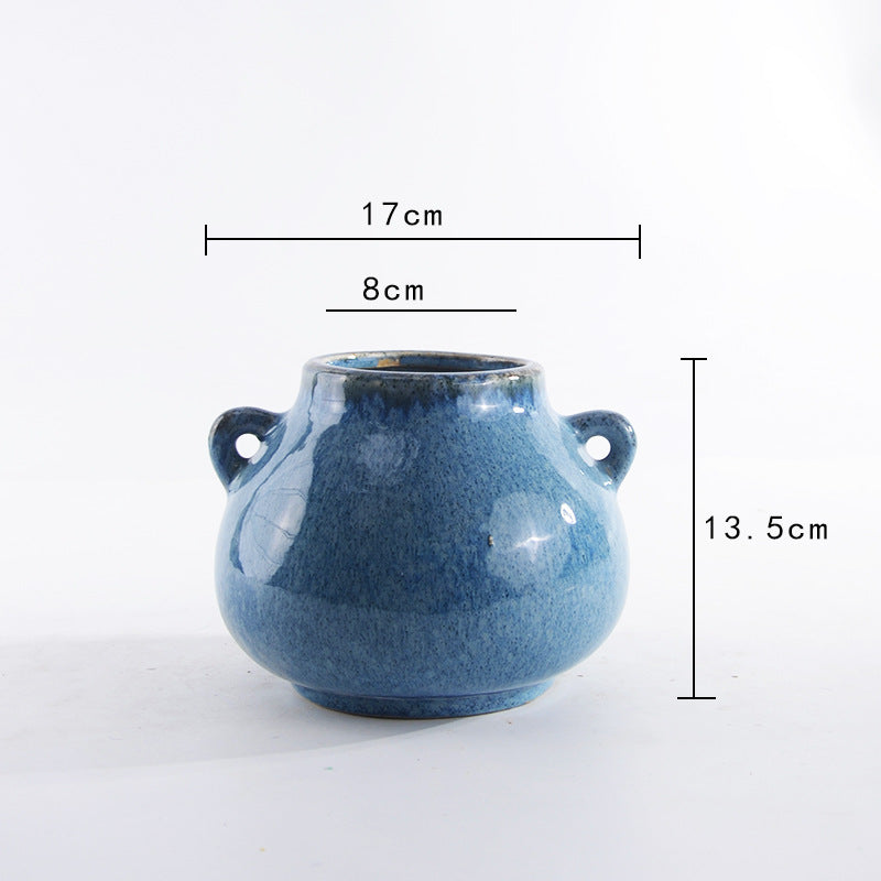 Decorative ceramic pot with playful handles Kalsten