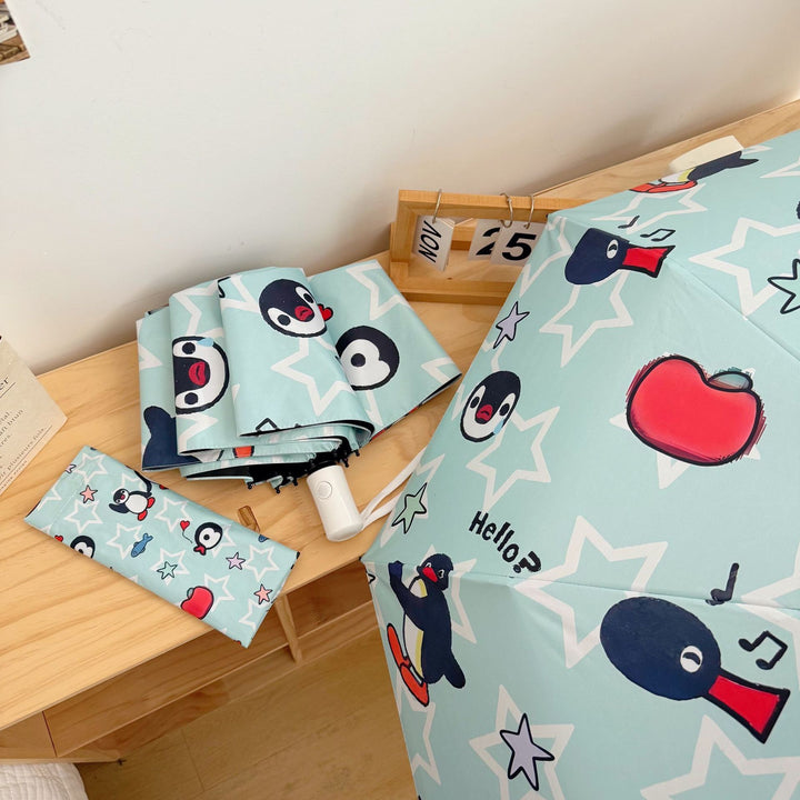 Ladies collapsible umbrella with playful penguin design Kalsten