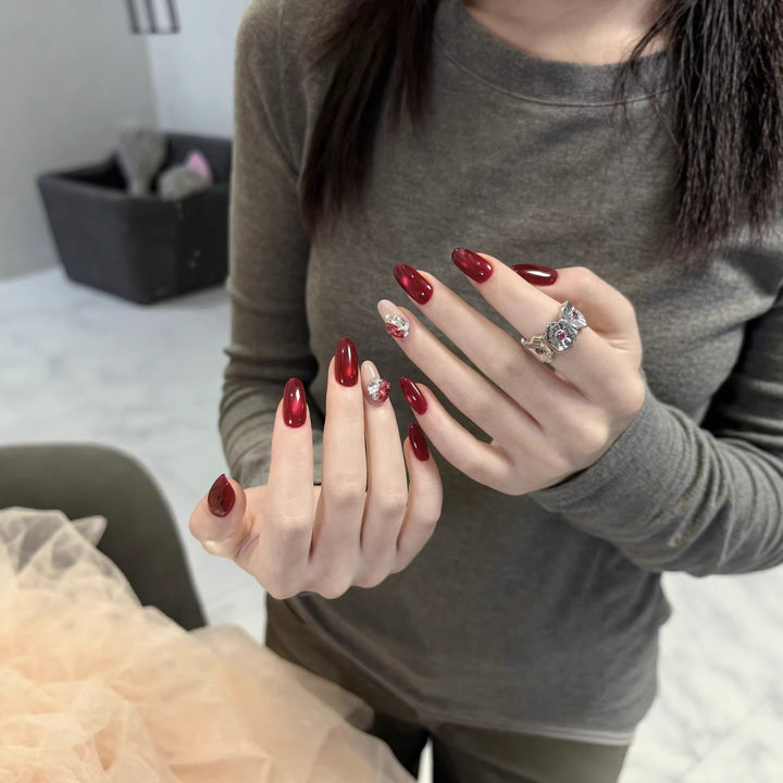 Elegant Press-On Nail Extensions with Decorative Gem Accents