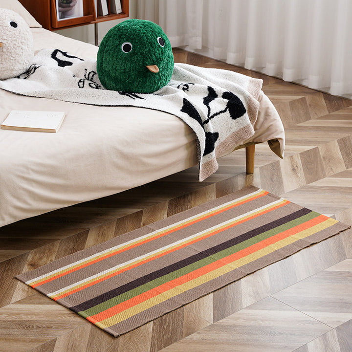 woven living room runner with fringes and geometric weave pattern