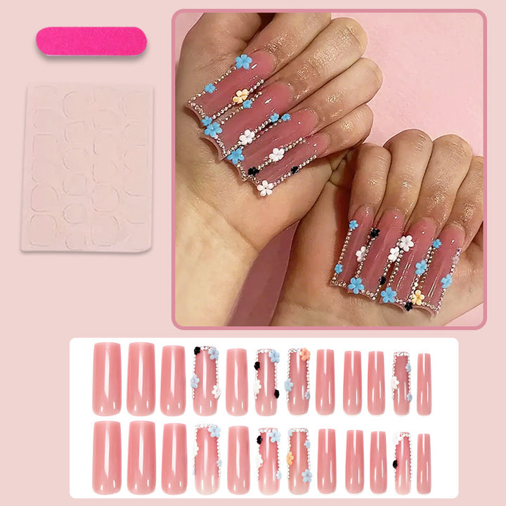 Artificial nail art set with floral decorations and glitter accents Kalsten
