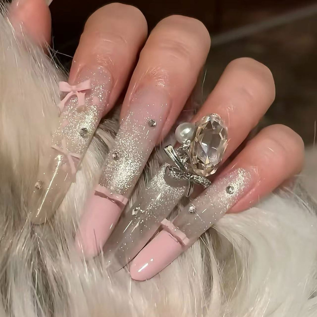 Glamorous Long Stiletto Nail Art Extensions with Rhinestone Accents